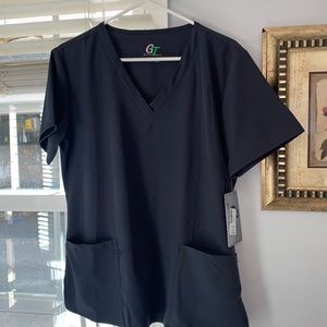 Scrub top never worn tag still on it